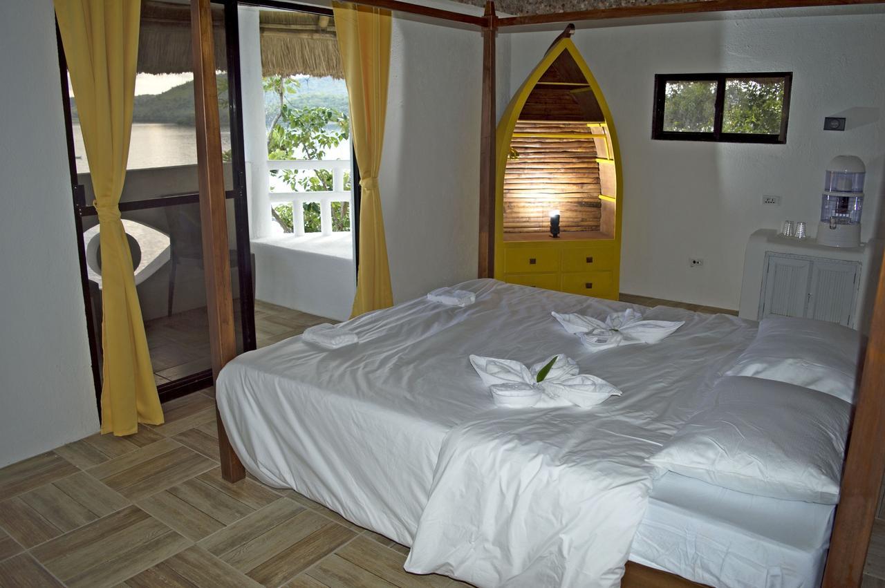 בוסואנגה Iris Island Eco Resort מראה חיצוני תמונה