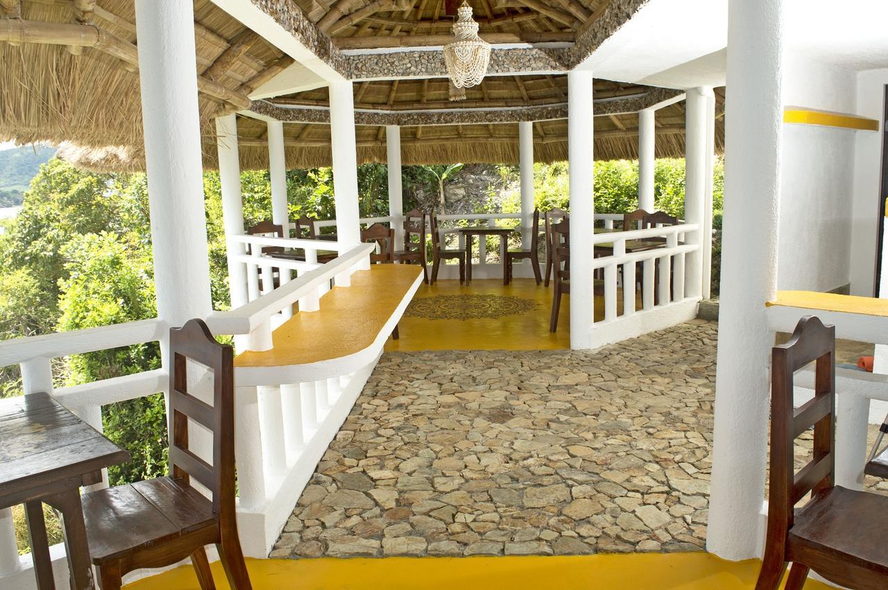 בוסואנגה Iris Island Eco Resort מראה חיצוני תמונה