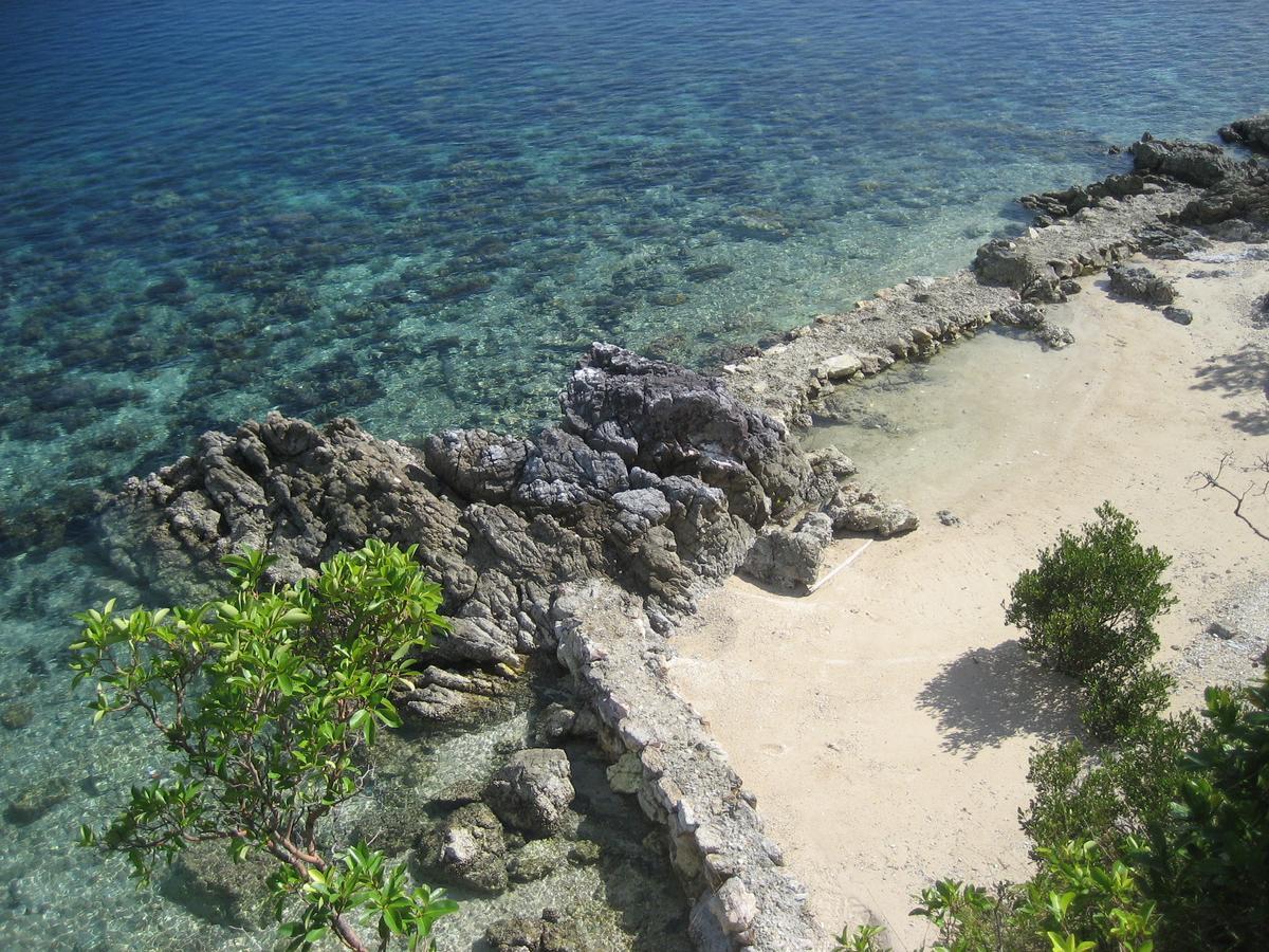 בוסואנגה Iris Island Eco Resort מראה חיצוני תמונה