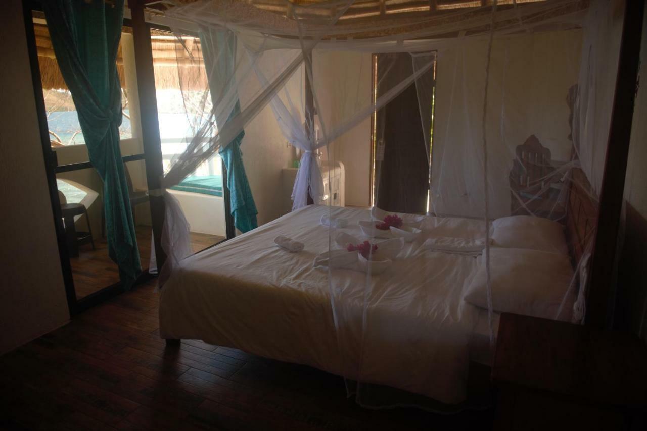 בוסואנגה Iris Island Eco Resort מראה חיצוני תמונה